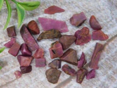 Collection of Uncut Red and Purple Stones