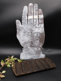 Cast Metal Glove-Like Structure with Corn Cob Motif
