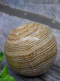 Polished Striped Stone Sphere ? Rock Auction Item