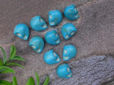 Set of Ten Blue Skull-Shaped Beads