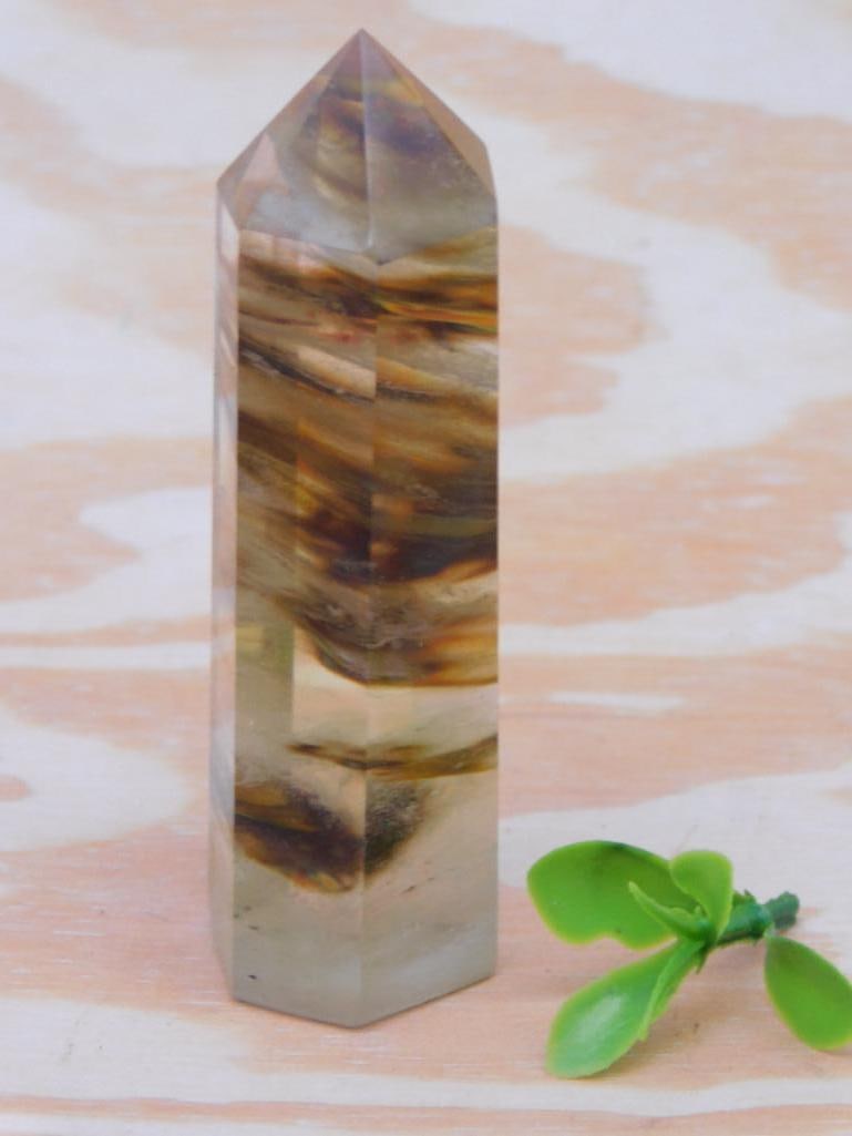 FLAME Quartz Crystal Tower with Inclusions ROCK STONE LAPIDARY SPECIMEN: Beautiful polished quartz crystal wand featuring distinct inclusions. Perfectly shaped with a tapered point on one end. Includes a small green decorative accent as shown in reference to size. Ideal fo
