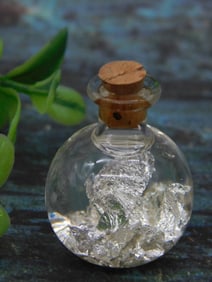 Glass Bottle Containing Real Silver Flakes