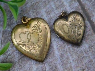 Pair of Heart-Shaped Gold-Tone Lockets with Floral Designs