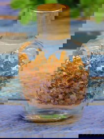 GOLD FLAKES IN BOTTLE ROCK STONE LAPIDARY SPECIMEN