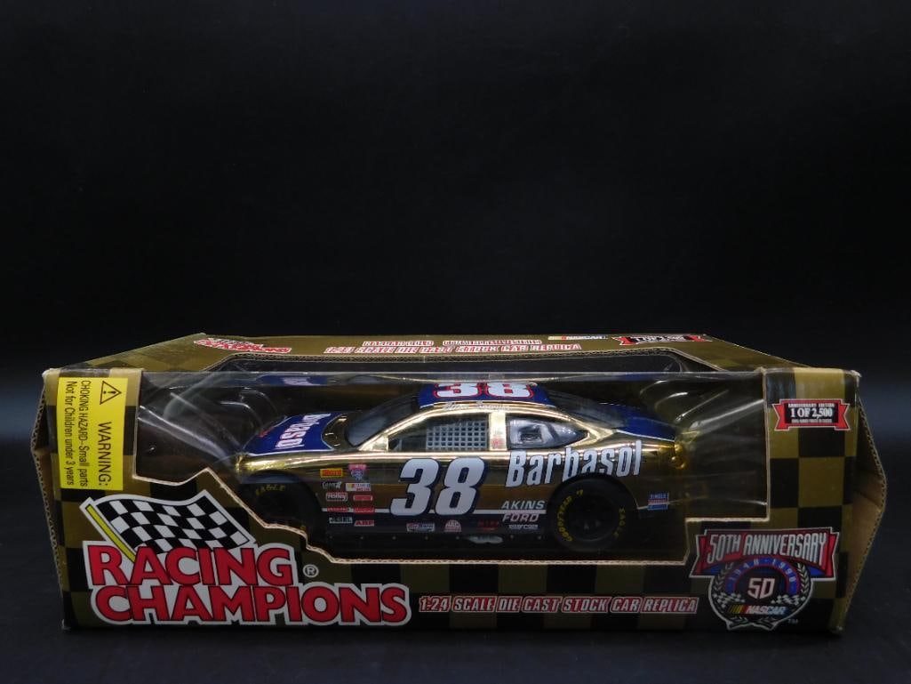Racing Champions 50th Anniversary NASCAR Die-Cast Car: 1:24 scale Racing Champions die-cast NASCAR stock car, commemorating the 50th anniversary of NASCAR. Features car #38 with Barbasol sponsorship in gold and blue finish. Includes original window packag