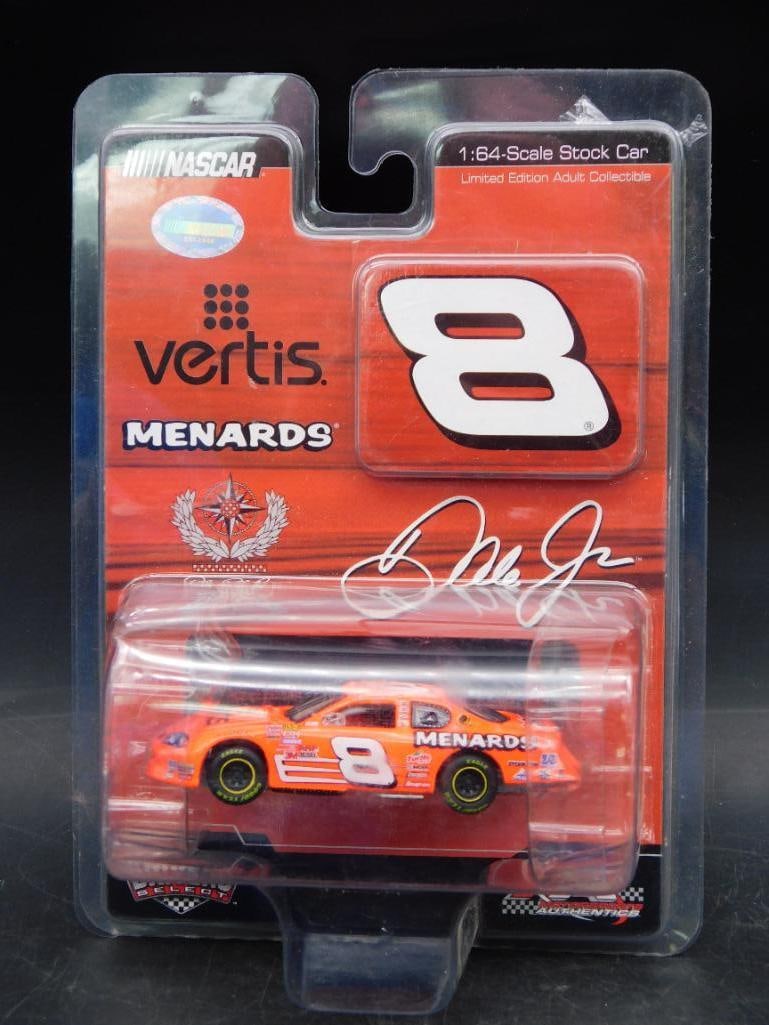 1:64 Scale NASCAR Diecast Car No. 8 Vertis Menard: 1:64 scale NASCAR diecast car featuring the No. 8 Vertis Menard design. Comes in original sealed packaging with clear plastic display. Packaging includes driver signature print and official NASCAR bra