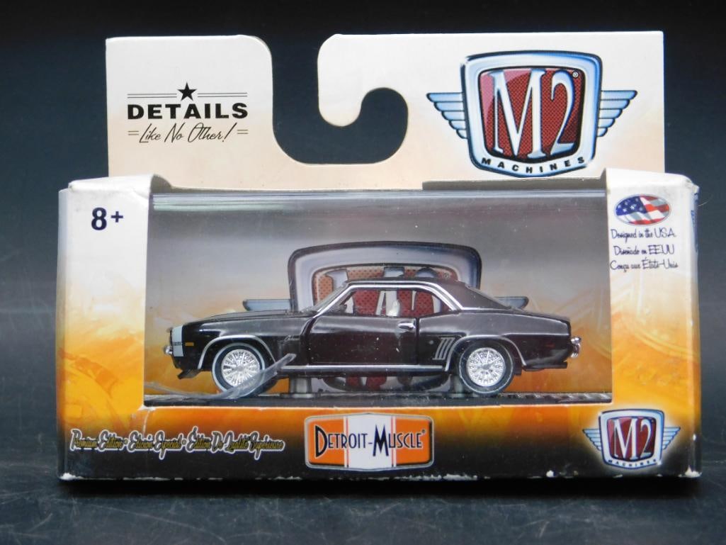 M2 Machines Detroit Muscle Die-Cast Model Car: M2 Machines Detroit Muscle die-cast metal model car with special '42 individual parts' feature. Includes authentic details and is designed to 1:64 scale. Packaged in its original box, with some wear v