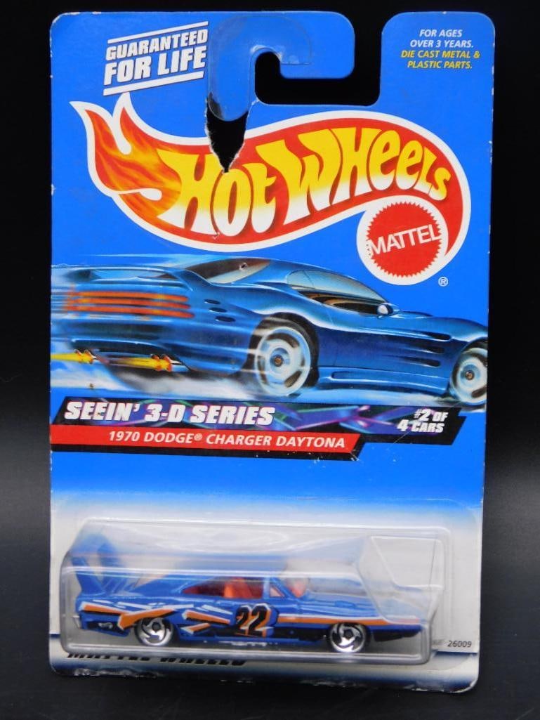 Hot Wheels 1970 Dodge Charger Daytona, Seein? 3-D Series: Sealed Hot Wheels 1970 Dodge Charger Daytona from the Seein' 3-D Series. Features a blue car with #22 race number. Part of a limited series, #2 of 4 cars. In original packaging with some wear, particu