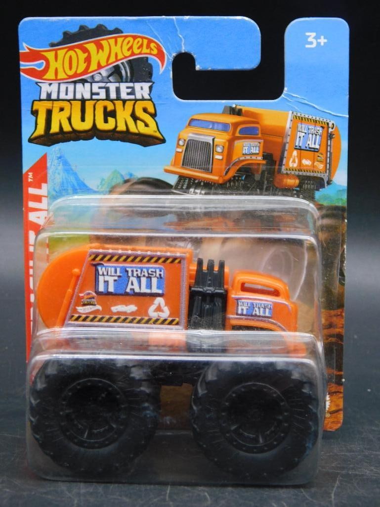 Hot Wheels Monster Trucks ?Will Trash It All,? Sealed Packaging: Hot Wheels Monster Trucks collectible toy truck labeled 'Will Trash It All' in sealed original packaging. Features bright orange design and bold lettering. Packaging indicates suitable for ages 3 and