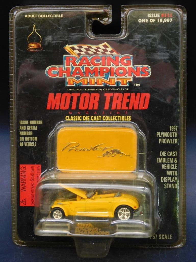 1997 Racing Champions Mint Motor Trend Die-Cast Car: 1997 Racing Champions Mint Motor Trend die-cast collectible car in original sealed packaging. Features a Plymouth Prowler model in yellow with detailed design and authenticity. Packaging includes bran