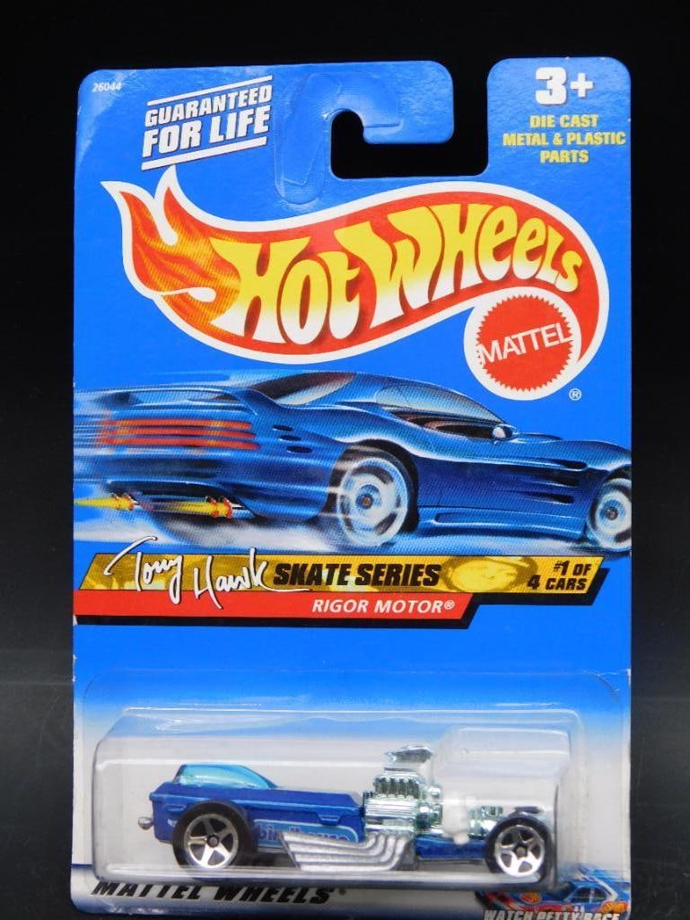 Hot Wheels Tony Hawk Skate Series Rigor Motor Car: Hot Wheels collectible car from the Tony Hawk Skate Series. Featuring the 'Rigor Motor' model, this is car #1 out of 4 in the series. Packaged in its original, unopened blister pack with clear graphic