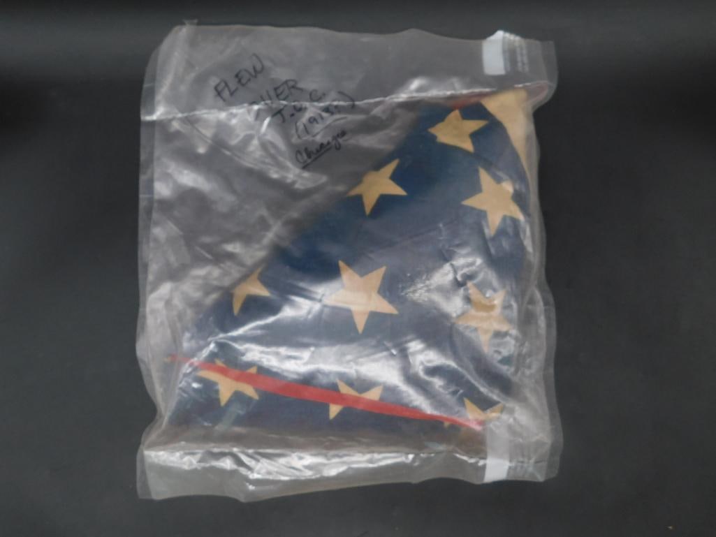 Folded American Flag in Sealed Bag With Notation (1 of 3)