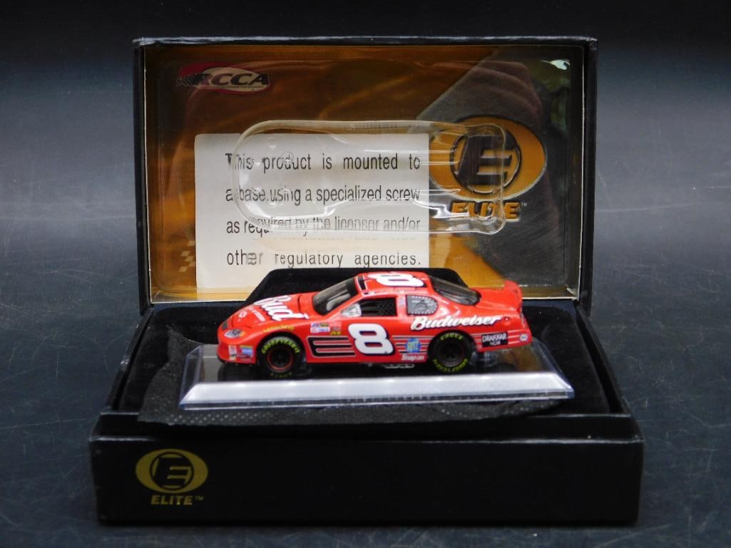 2003 Dale Earnhardt Jr. Elite #8 Monte Carlo Collectible Car: Action RCCA Elite 1:64-scale diecast car featuring Dale Earnhardt Jr.'s #8 Budweiser paint scheme. Limited edition, 1 of 3,660 produced. Comes in original packaging with gold foil details and black bo