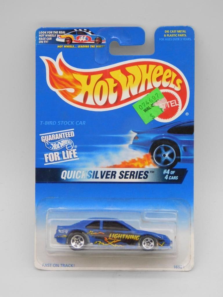 Hot Wheels Quick Silver Series Car #4/4 in Original Packaging: Hot Wheels Quick Silver Series Turbo Stock Car, collector #548. Features blue car with yellow accents and 'lightning' graphics. Item is in original unopened blister packaging. Package includes details
