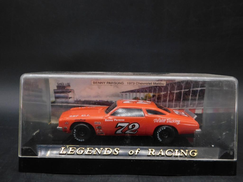 Benny Parsons 1973 Chevrolet Malibu Model in Display Case: Die-cast model of Benny Parsons' 1973 Chevrolet Malibu from the 'Legends of Racing' series. Housed in an original display case with printed details and background imagery. Item includes detailed biogr