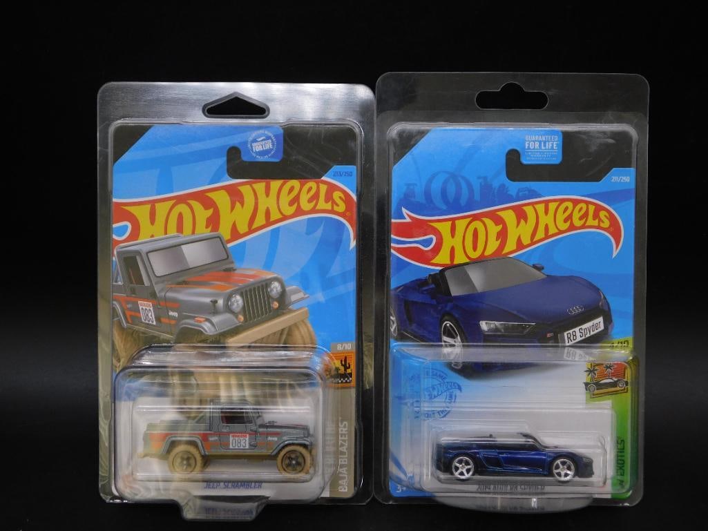 Hot Wheels Jeep and Audi Die-Cast Car Set in Packaging: Set of two Hot Wheels die-cast vehicles in original packaging. Includes a Jeep Scrambler from the Baja Blazers series and an Audi R8 Spyder from the HW Exotics series. Both items feature detailed card