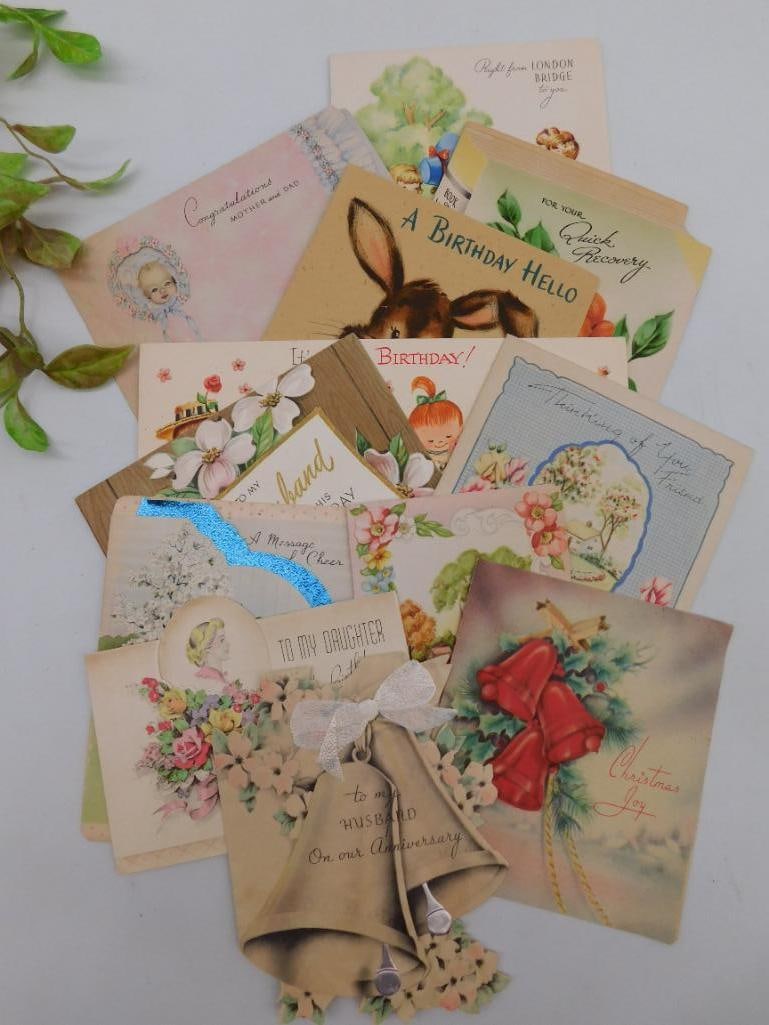 Collection of Vintage Greeting Cards Assortment: This lot includes an assortment of vintage greeting cards with various designs and themes. Cards feature floral patterns, animals, and holiday-related illustrations, such as Christmas and birthday mot