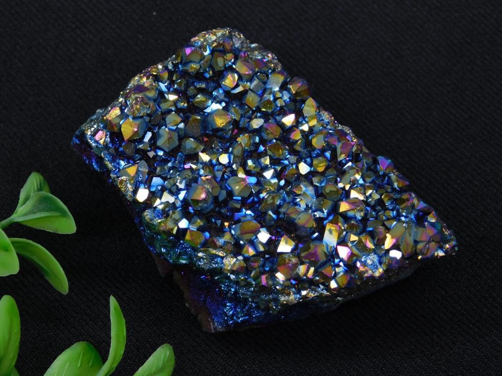 TITANIUM AMETHYST ROCK STONE LAPIDARY SPECIMEN: - Natural chalcopyrite mineral specimen with iridescent surface. | - Exhibits vibrant hues of blue, gold, and purple tones. | - Clustered crystalline structure with sparkling aesthetic. | - Dimensions