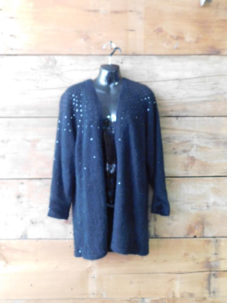 Etoile Lambswool and Angora Cardigan Sweater, Size Large: Elegant women's cardigan sweater by Etoile. Made of 60% lambswool, 30% angora rabbit hair, and 10% nylon, with a 100% silk lining. Features a black color palette and embellished detailing. Labeled as