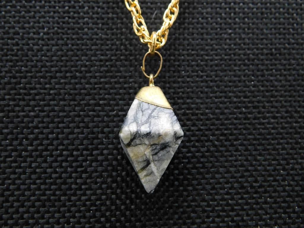 Gold-Tone Chain Necklace with Diamond-Shaped Stone Pendant: - Features a gold-tone chain with a clasp closure. | - Pendant is diamond-shaped with a marbled stone appearance. | - Top of the pendant is encased in a gold-tone cap. | - Chain has a medium length, a