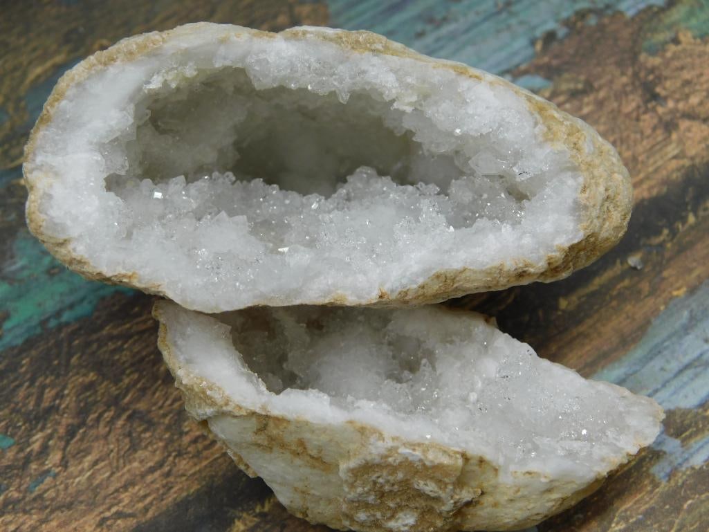 Natural Quartz Geode With Crystalline Interior Rock Stone Lapidary Specimen: - Natural geode with a sparkling quartz crystalline interior. | - Outer shell features a rough, natural beige finish. | - Comes in two halves, showcasing the inner crystal formation. | - Approximate w