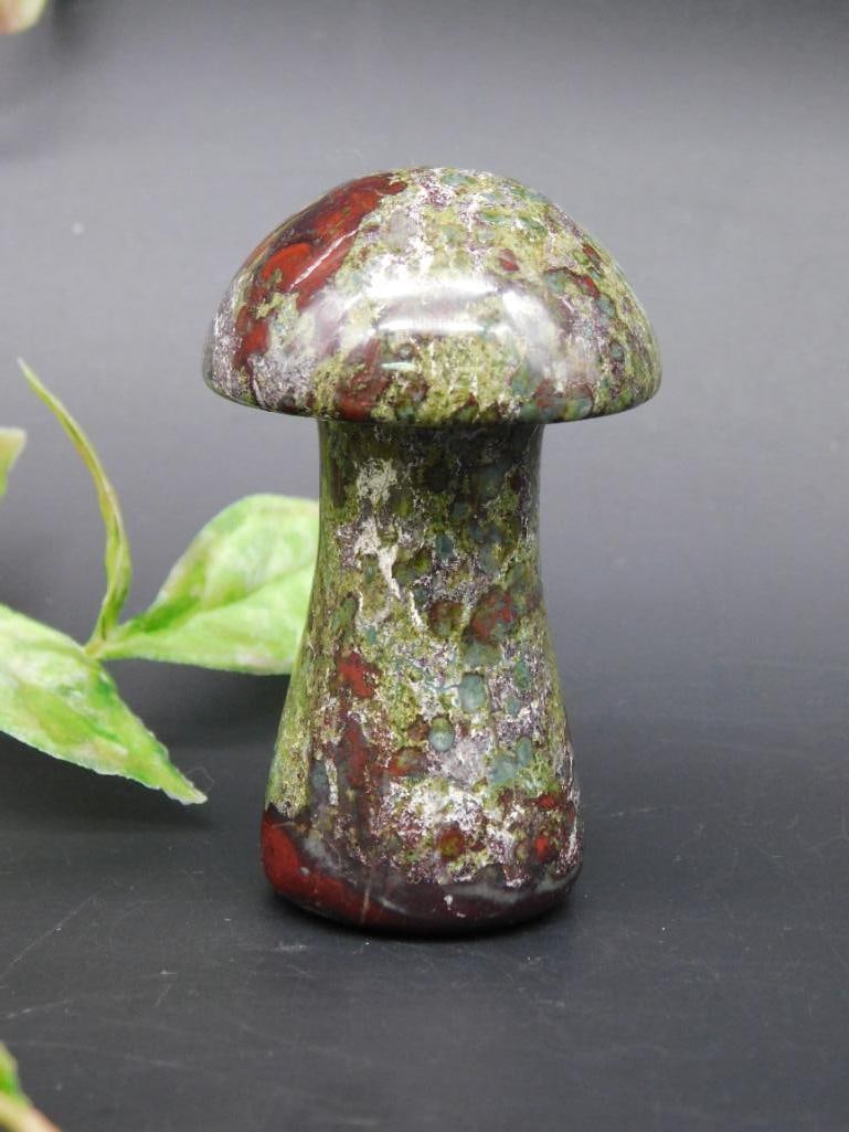 Dragon Bloodstone Mushroom Form Decorative Stone: Polished decorative stone in the shape of a mushroom. Accompanied by a measurement scale for size reference.