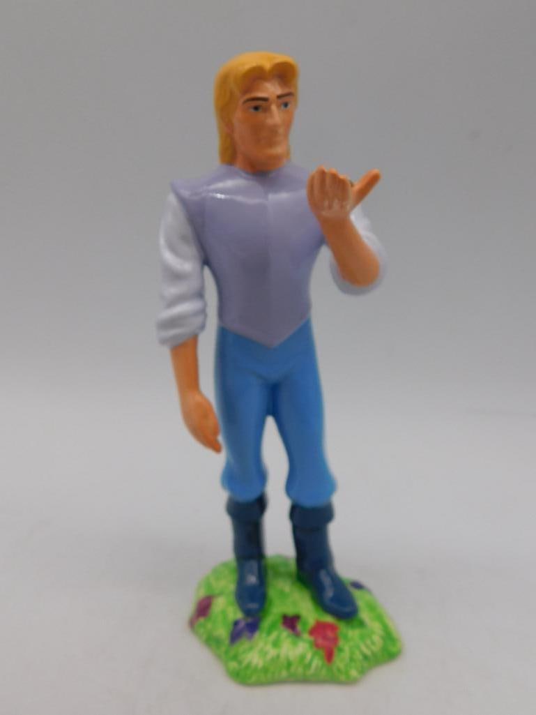 Enesco Disney Pocahontas John Smith Figurine: - Enesco figurine featuring the character John Smith from Disney's Pocahontas. | - Officially licensed Disney collectible, as indicated by the Disney logo. | - Made in Malaysia, with original manufact