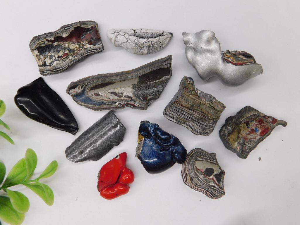 Fordite Motor City Agate Rock Stone Lapidary Specimen: - Assorted multicolored automotive paint agate pieces, also known as fordite or Detroit agate. | - Includes 10 distinct pieces of varying shapes, colors, and patterns. | - Highlights include vibrant r