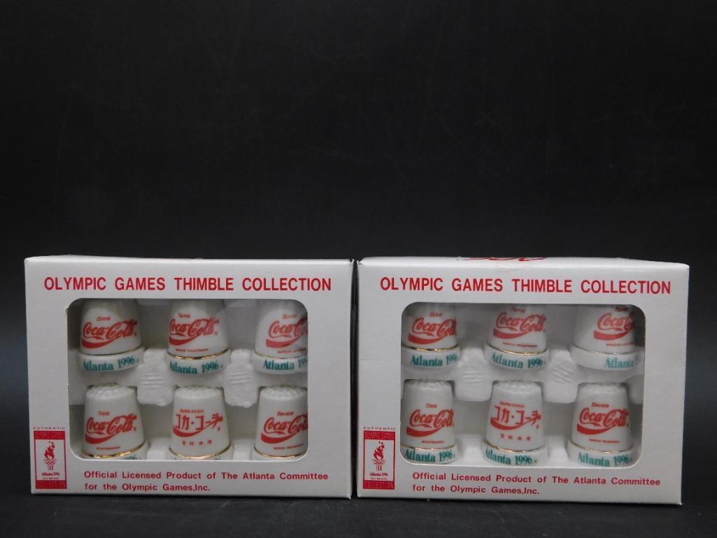 Olympic Games Coca-Cola Thimble Collection (1996): - Includes 2 boxed sets of Coca-Cola thimble collections. | - Features designs commemorating the 1996 Atlanta Olympic Games. | - Official licensed product of the Atlanta Committee for the Olympic Game