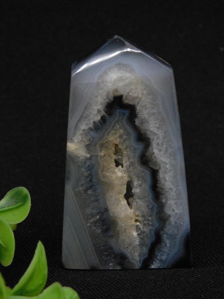 Agate Geode Point Rock Stone Lapidary Specimen: - Polished agate crystal point featuring a natural geode cavity at the center. | - Streaks of gray, white, and beige tones with intricate natural patterns. | - Measurement provided: weight of 48 grams