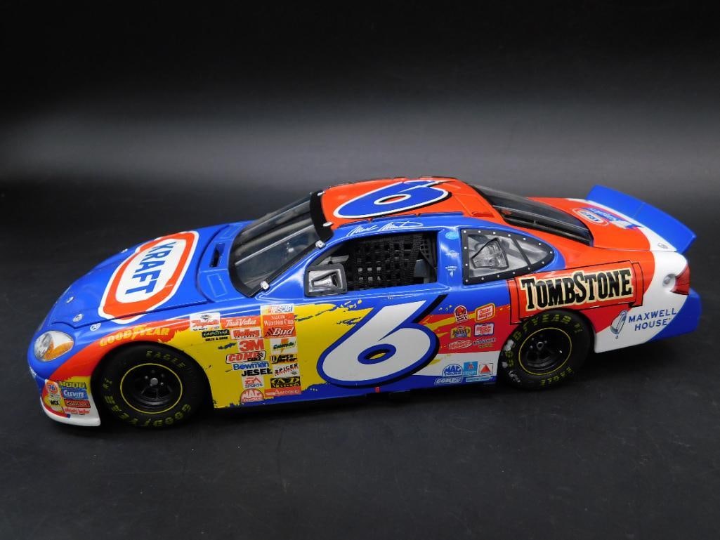 1:24 Scale 2002 Team Caliber Diecast NASCAR Replica: 1:24 scale diecast car replica featuring the Kraft and Tombstone Pizza branding from the 2002 NASCAR series. Produced by Team Caliber in its Preferred lineup. Includes original box with details confir