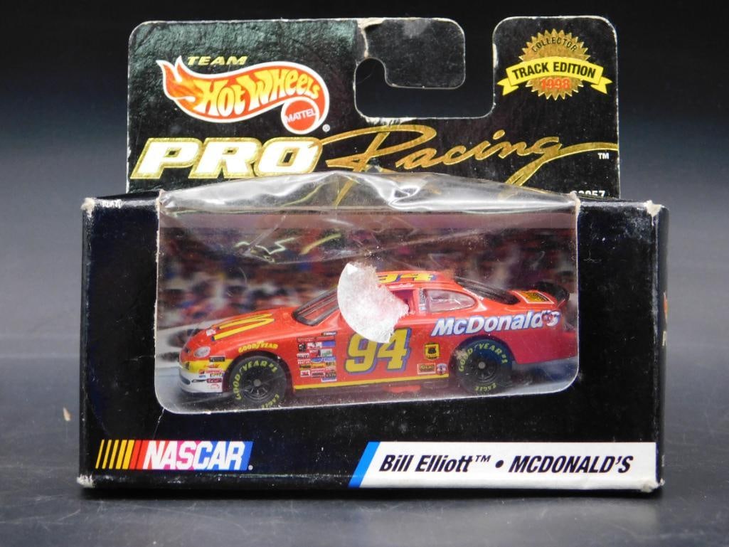 Hot Wheels NASCAR Pro Racing Bill Elliott McDonald?s Car: 1:64 scale Hot Wheels Pro Racing NASCAR car featuring Bill Elliott's McDonald?s design. Track Edition from 1998. Item comes in original packaging with visible wear, including a torn upper tab. Packagi