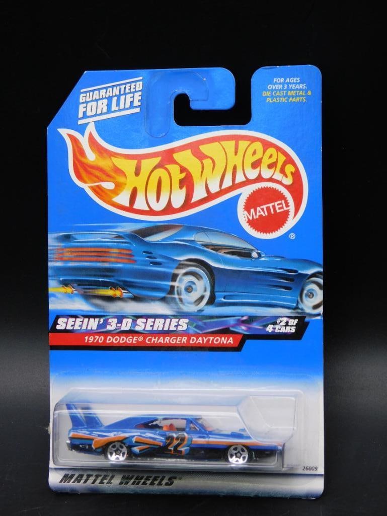 Hot Wheels 1970 Dodge Charger Daytona, Seein 3-D Series: Hot Wheels 1970 Dodge Charger Daytona die-cast car, part of the Seein' 3-D Series. This is #2 of 4 cars in the series, packaged in original sealed blister packaging. Backside of the packaging features