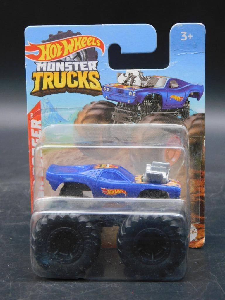 Hot Wheels Monster Trucks Rodger Dodger, New in Package: Hot Wheels Monster Trucks Rodger Dodger model. The toy remains sealed in its original packaging. Packaging shows minimal wear and tear, with the toy visibly intact inside the blister pack. Backside co