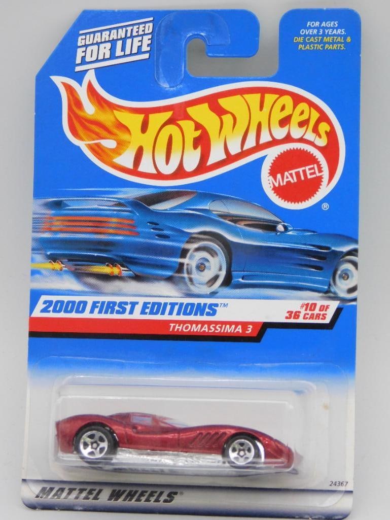 2000 Hot Wheels Thomassima 3 Car, First Edition: Hot Wheels 2000 First Editions 'Thomassima 3', #10 of 36 cars. Mint on card packaging. Card shows standard retail wear. Vehicle is red with stylized detailing. Includes original Hot Wheels branding an