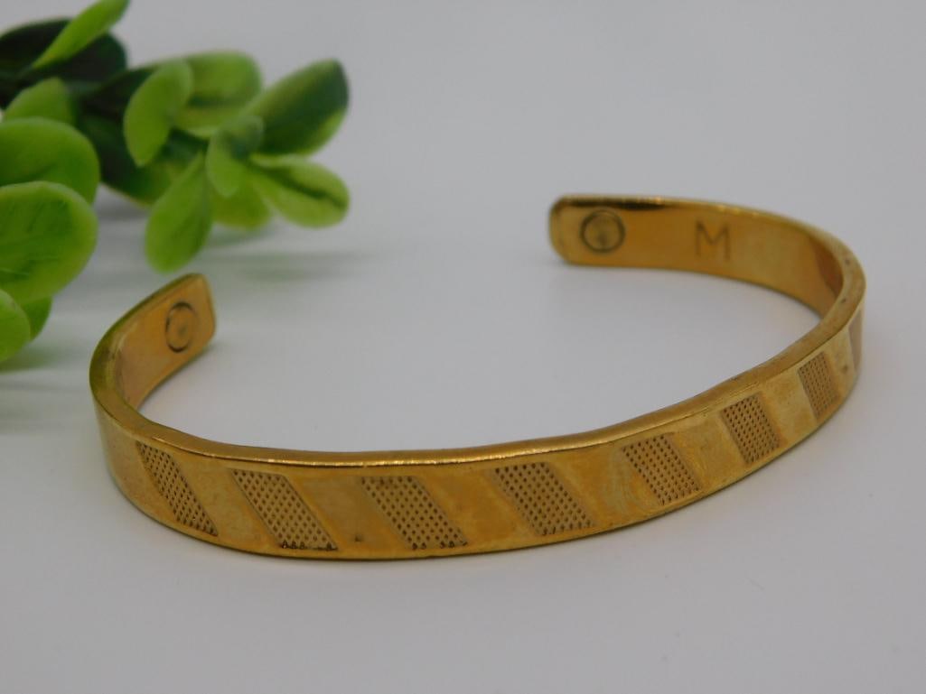 24K GOLD ELECTRO PLATED CUFF BRACELET: 24K GOLD ELECTRO PLATED CUFF BRACELET ANY PURCHASE OF GOLD, SILVER, OR DIAMONDS OVER $300 WILL REQUIRE PAYMENT VIA WIRE TRANSFER OR CASH.