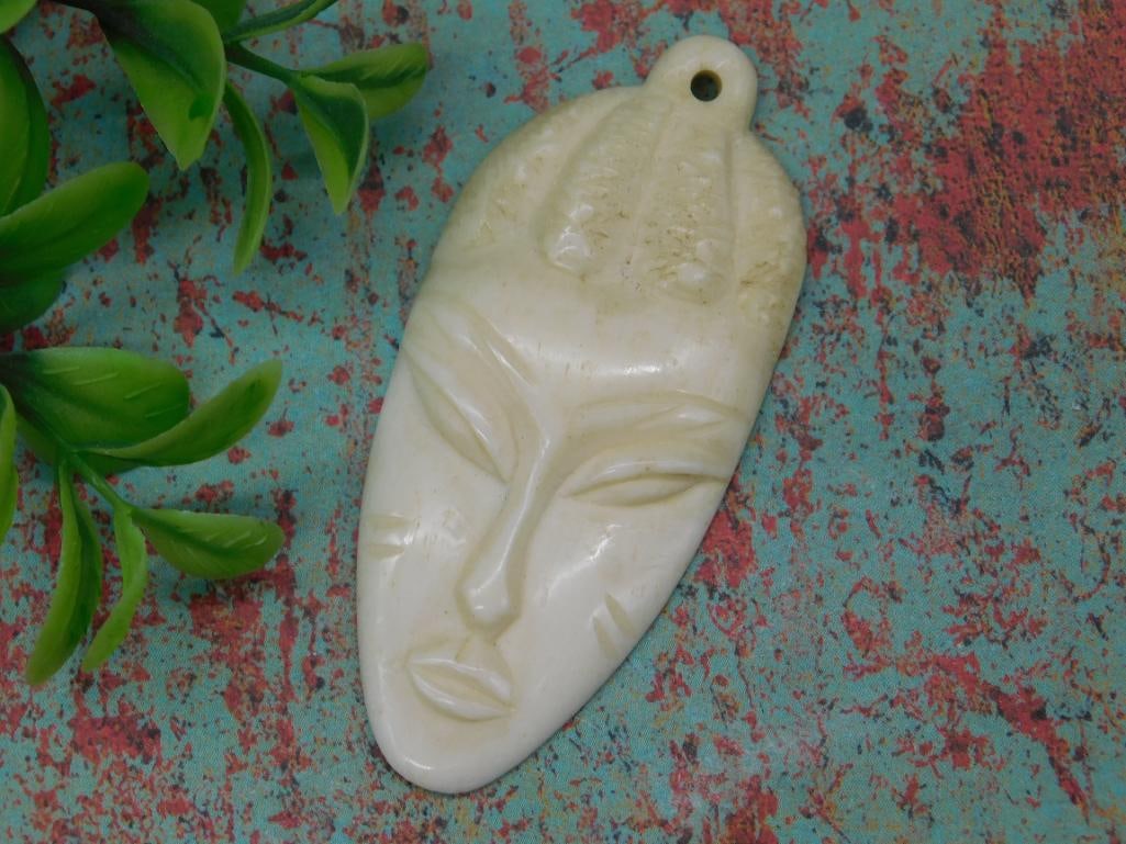 CARVED MASK PENDANT ROCK STONE LAPIDARY SPECIMEN: CARVED MASK PENDANT ROCK STONE LAPIDARY SPECIMEN