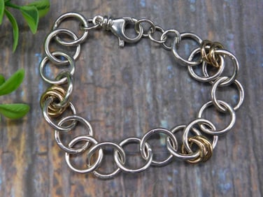 STERLING SILVER AND 14K GOLD LINK BRACELET