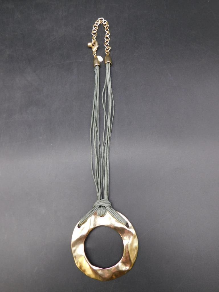 METAL PENDANT ON MULTI-STRAND NECKLACE: METAL PENDANT ON MULTI-STRAND NECKLACE