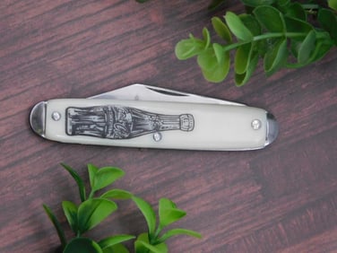 Vintage White Folding Knife With Bottle Illustration