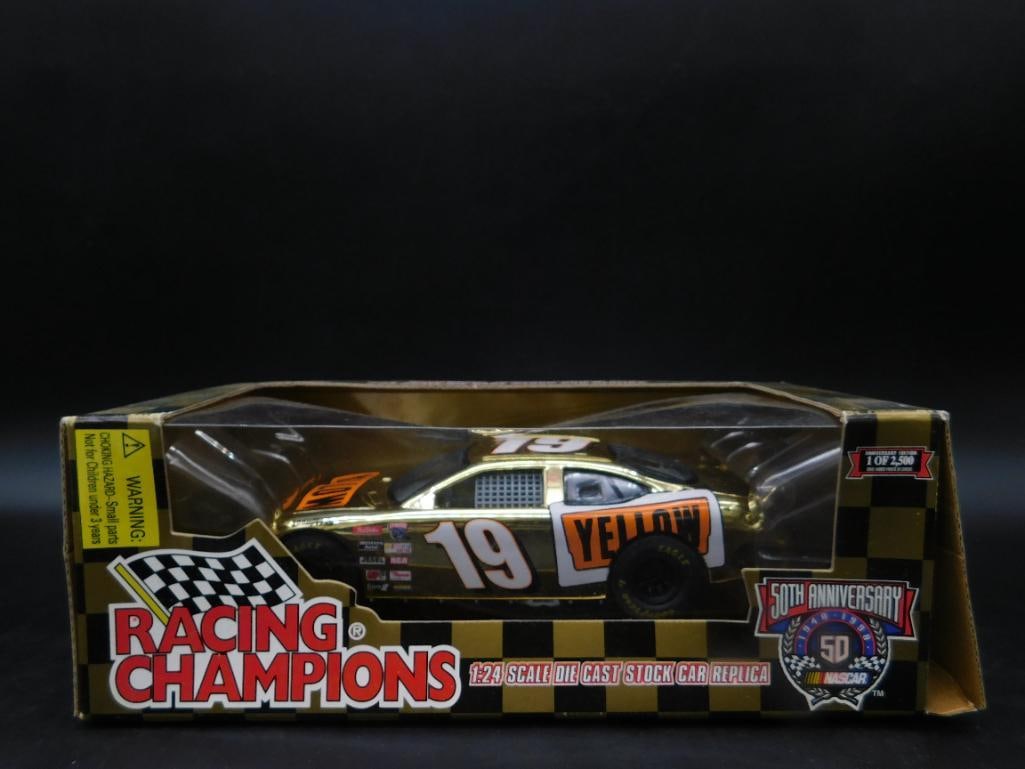 Racing Champions 1:24 Scale Stock Car Replica, NASCAR 50th: Racing Champions 1:24 scale die-cast stock car replica from the NASCAR 50th-anniversary series. Features the number 19 Yellow car design. Item is in its original packaging, which shows some wear. Incl