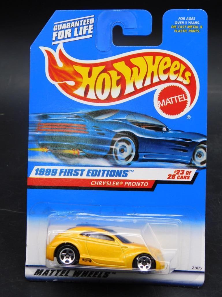 1999 Hot Wheels First Editions Chrysler Pronto: 1999 Hot Wheels First Editions Chrysler Pronto car, 23rd of 26 cars in the series. Features a bright yellow color with detailed packaging. The packaging remains unopened and in good condition, with mi