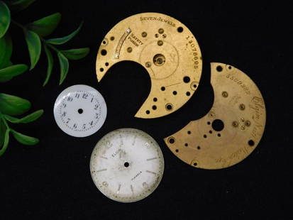 Vintage Watch Movement Parts and Dials Lot WATCHMAKER WATCHMAKING TOOLS: - Lot consists of two partial watch movements and two loose watch dials. | - One watch movement is labeled "Seven Jewels, Safety Pinion" and marked "13078695." | - The other movement is inscribed