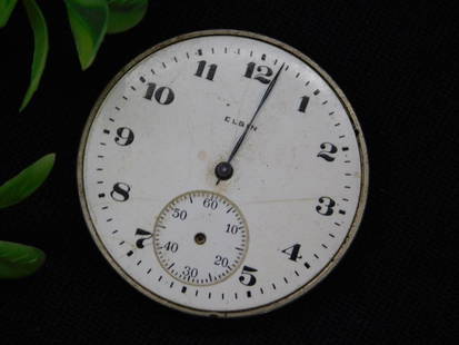 Antique Elgin National Watch Co. Pocket Watch Movement WATCHMAKER WATCHMAKING TOOLS: - Elgin National Watch Co. pocket watch movement | - Features a white enamel dial with black Arabic numerals and a subdial at 6 o'clock | - Movement includes visible gears and a regulator marked with