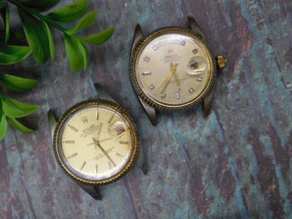 Rolex Oyster Perpetual Datejust Watch Cases WATCHMAKER WATCHMAKING TOOLS: - Lot includes two Rolex Oyster Perpetual Datejust watch cases. | - Both watches feature gold-tone bezels and stainless steel case backs. | - The dials show visible wear, including patina and marks. |