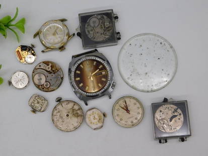 Vintage and Antique Watch Movements and Cases WATCHMAKER WATCHMAKING TOOLS: - Includes a mix of vintage watch movements and cases, some branded (e.g., Hamilton). | - Contains approximately 10 individual pieces with varying levels of completeness. | - Features mechanical movem