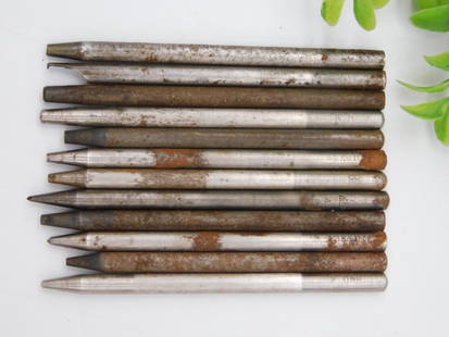 Vintage Watchmakers Punches, Lot of 12 WATCHMAKER WATCHMAKING TOOLS: - Lot of 12 vintage watchmakers' punches of varying sizes and lengths. | - Made of metal, showing wear and surface rust consistent with age and use. | - Markings and measurements visible on some punch