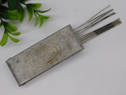 Vintage Airco Welding Rods in Metal Case WATCHMAKER WATCHMAKING TOOL: - Vintage Airco welding rods in a branded metal case. | - Rectangular metal case with embossed 'Airco' logo on one side. | - Case contains multiple small welding rods suitable for various