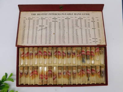 Bestfit Interchangeable Watch Hands Guide Set WATCHMAKER WATCHMAKING TOOL: - Includes original Bestfit Interchangeable Watch Hands Guide chart, visible on the case lid. | - Contains multiple glass tubes, some labeled 'Bestfit,' holding watch hands and parts. | - Red
