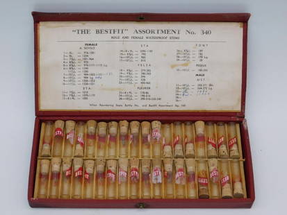 Vintage Bestfit Assortment No. 340 Watch Stems Set WATCHMAKER WATCHMAKING TOOLS: Vintage Bestfit Assortment No. 340 set with labeled watch stems. | Contains numerous glass vials with cork stoppers, each containing watch stems labeled 'Bestfit.' | Includes an inner reference guide